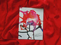 "Trigger Warning" zine cover — explosive pink, red and black paint splatter with dripping ink on white paper, handwritten title in corner, on red satin fabric